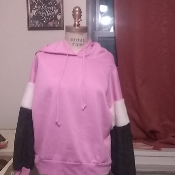A pink hoodie with plush sleeves - Picture 1 of 3